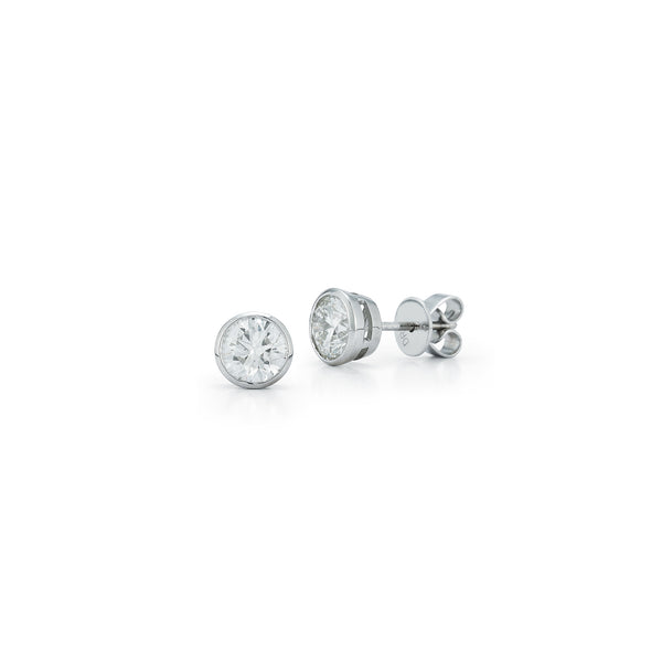 White Gold-1^Designer Stud Earrings: DRD Round Bezel Set Solitaire Studs 1.40 Ct. Total Weight in White Gold